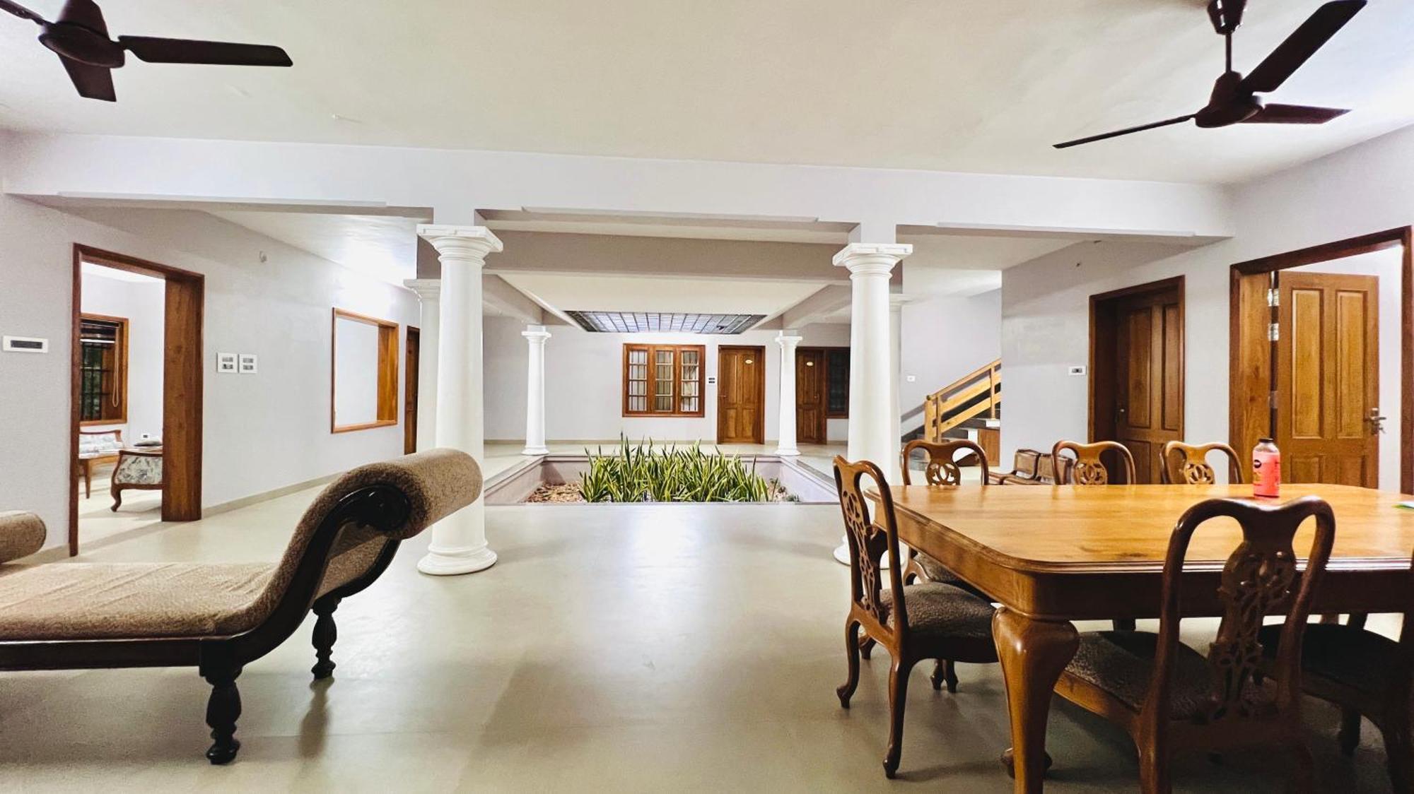 Ferienwohnung Waterfront By Palmyra Kollam Exterior foto