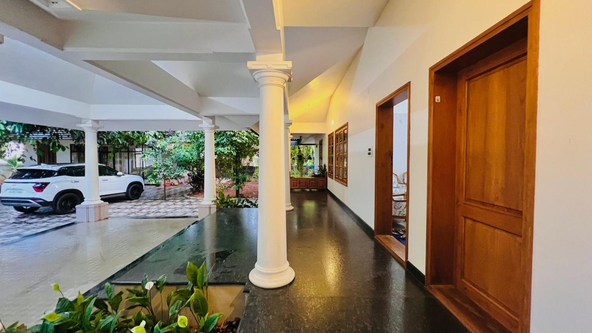Ferienwohnung Waterfront By Palmyra Kollam Exterior foto